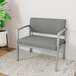 A Lesro Lenox steel bariatric guest chair with armrests in gray fabric.