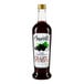 A bottle of Amoretti Cassis Craft Puree with a label on a white background.