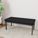 A black Lesro Lenox steel bench with black vinyl cushions.
