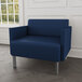 A Lesro Luxe Lounge Patriot Plus bariatric arm chair with steel legs in blue vinyl.