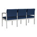 A row of three blue Lesro Lenox steel sofas with center arms.