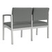 A grey Lesro Lenox loveseat with silver legs.