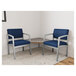 Two Lesro Lenox blue vinyl guest chairs with a Sarum Twill laminate corner table in a lounge area