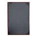 An oak wood menu cover with black panels and album style corners.