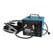 A blue and black General Pipe Cleaners Hot-Shot 320 pipe thawer with cables and pipe clamps.