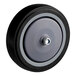 A black wheel with a silver rim and nut on a white background.