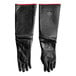 A pair of black neoprene gloves with red trim.