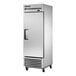 A stainless steel True refrigerator/freezer with a black handle.