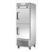 A stainless steel True combination refrigerator/freezer on wheels with black handles.