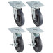 A group of ServIt heavy-duty casters with black rubber wheels.