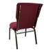 A maroon Flash Furniture church chair with a black metal frame.