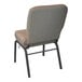 A tan speckled Flash Furniture church chair with a black frame.