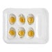 A plastic tray with yellow and white Crafty Counter Wunder Egg halves.