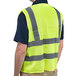 A man wearing a lime yellow Cordova Class 2 high visibility safety vest.