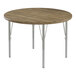 A Correll round activity table with metal legs and a hickory top.