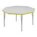 A white and yellow hexagon Correll activity table top with silver legs and yellow trim.