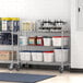 A Regency stainless steel wire shelving unit in a kitchen with containers on the shelves.