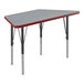 A grey rectangular Correll activity table with black legs and red trim.