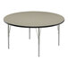 A round Correll activity table with metal legs and a black edge.