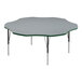 A gray table with a green top.