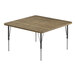 A square wooden Correll activity table with metal legs.