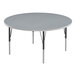 A Correll round activity table with gray top and black legs.