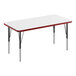 A white rectangular Correll activity table with black legs and red edges.