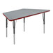 A grey rectangular Correll activity table with black legs and red trim.