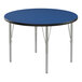 A Correll round activity table with a blue top and silver legs.