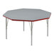 A gray high-pressure laminate octagon activity table with silver legs and red trim.