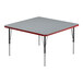 A square gray activity table with black legs and a red edge.