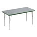 A rectangular activity table with a gray top and green border on silver legs.