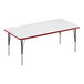 A white rectangular Correll activity table with a red edge.