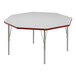 A white and red hexagon Correll activity table top.