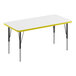 A white rectangular Correll activity table with yellow edges.