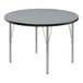 A Correll round activity table with silver legs and a black top.
