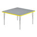 A grey square table with a yellow edge.