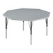 A gray octagon Correll activity table with gray T-mold and black legs.