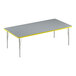 A grey rectangular Correll activity table with yellow edges.