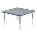 A square activity table with blue legs and a blue edge.