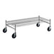 A Regency stainless steel wire dunnage rack with black wheels.