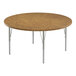 A round wooden Correll activity table with silver legs.