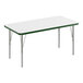 A white rectangular Correll activity table with green edges and silver legs.
