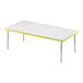 A white rectangular Correll activity table with a yellow edge.