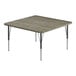 A square Correll activity table with a New England Driftwood top and black metal legs.