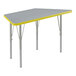 A grey and yellow trapezoid activity table with silver legs.