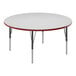 A white round table with a red edge.