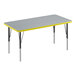 A grey rectangular Correll activity table with yellow edges.