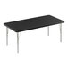 A Correll rectangular black granite activity table with silver legs.