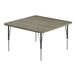 A square Correll activity table with a New England Driftwood top and metal legs.